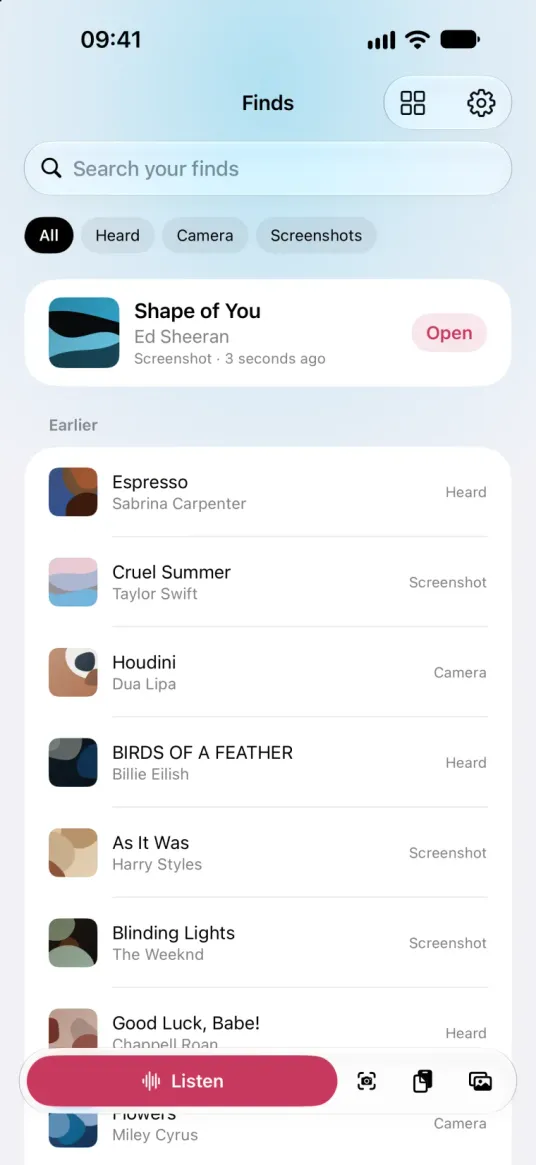 SongFetch Finds library on iPhone, with a search field, filters for Heard, Camera and Screenshots, the newest find on its own card, earlier finds labelled by how they were found, and the Listen, camera, paste and photos buttons along the bottom.